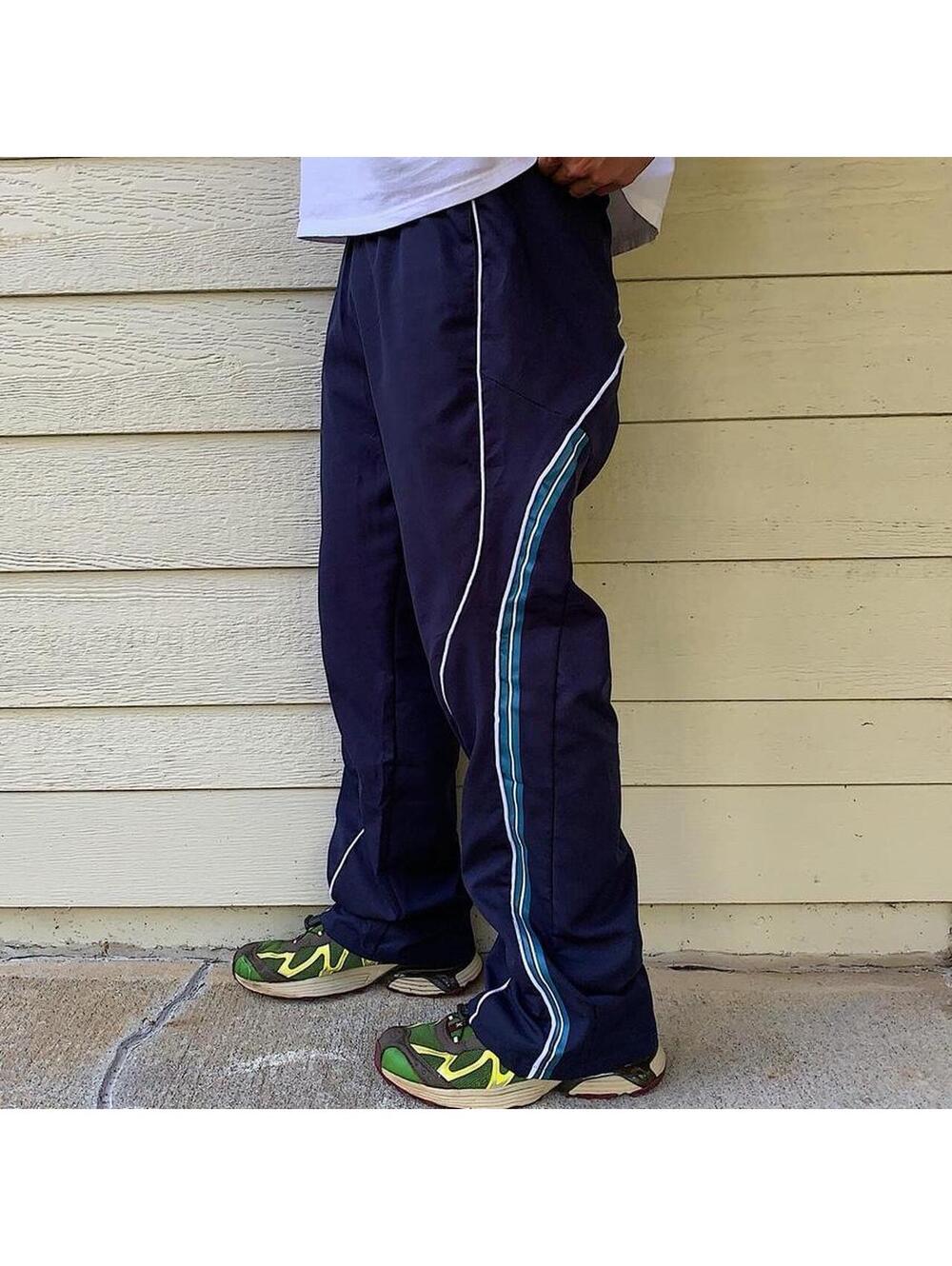 lightweight striped blue and white windbreaker pants. Wide leg opening. Size - Picture 2 of 8